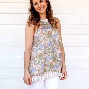 Halter style, high neck sleeveless tasseled floral top